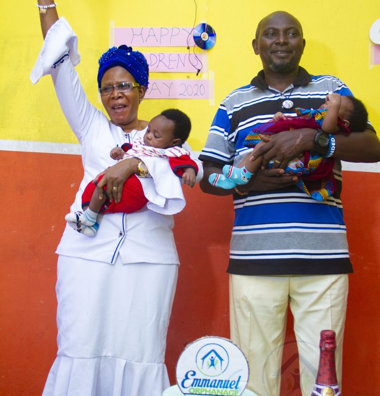Dr. P.I.A. & Mrs. Favour O. Obaseki celebrating with the children at Emmanuel Orphanage Home